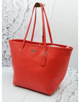 Coach orange store tote bag